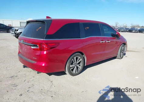 2022 Honda Odyssey Touring z USA, uszkodzony, nr VIN 5FNRL6H82NB018231
